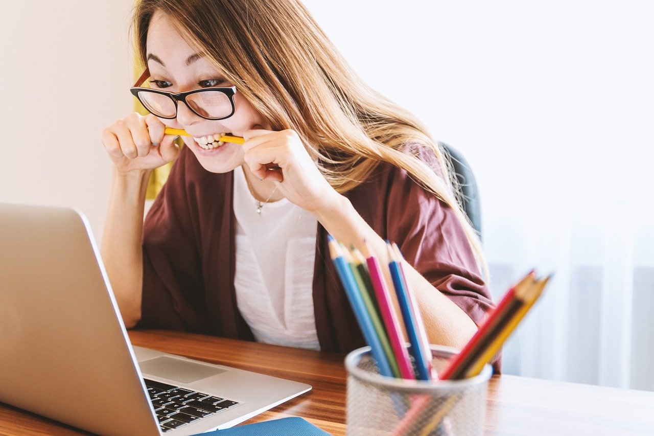 http://laptop,%20woman,%20education